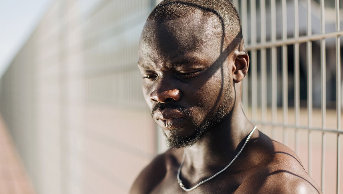 Weed in the Bahamas: Cannabis Legal Status Guide: A black young man in a prison Weed in the Bahamas: Cannabis Legal Status Guide: A black young man in a prison